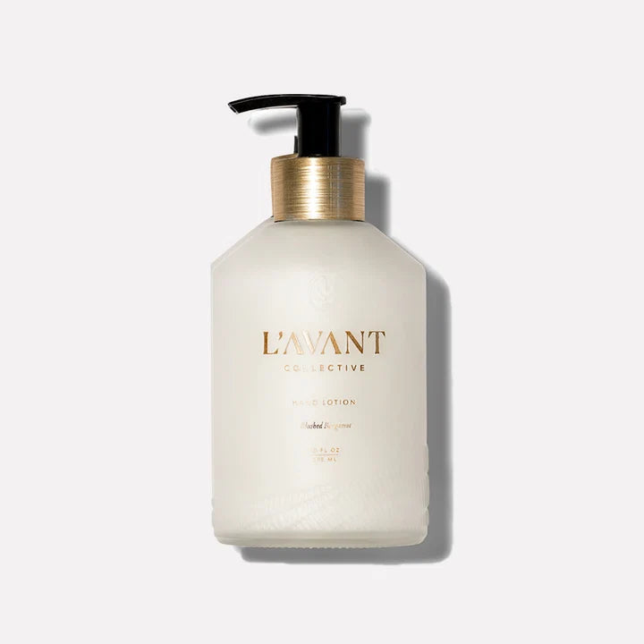L’AVANT Collective Blushed Bergamot Hand Lotion 10 oz in a luxury cream bottle with gold accents