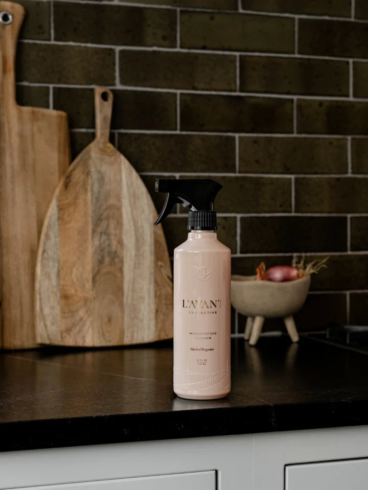 L’AVANT Blushed Bergamot Multipurpose Cleaner displayed on a dark kitchen countertop