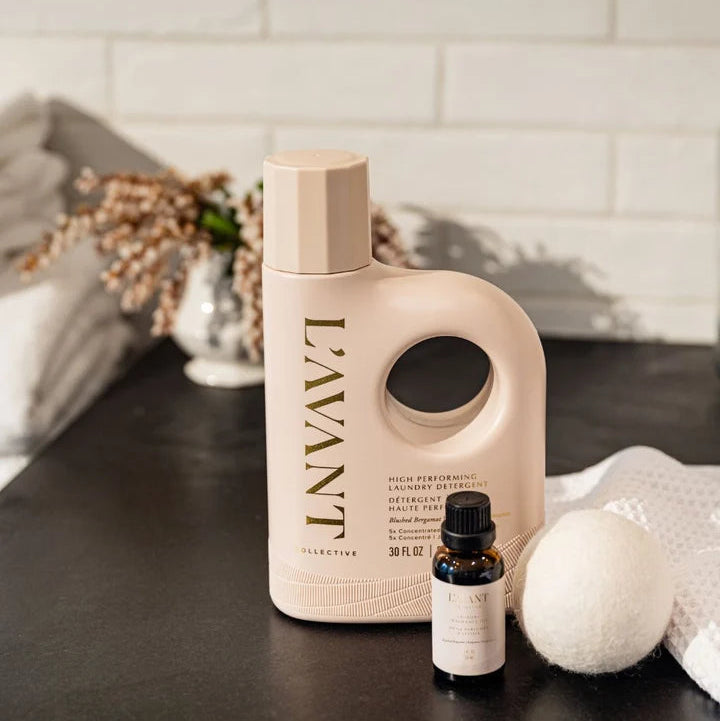 L’AVANT Collective Blushed Bergamot Laundry Detergent with laundry fragrance oil and wool dryer ball
