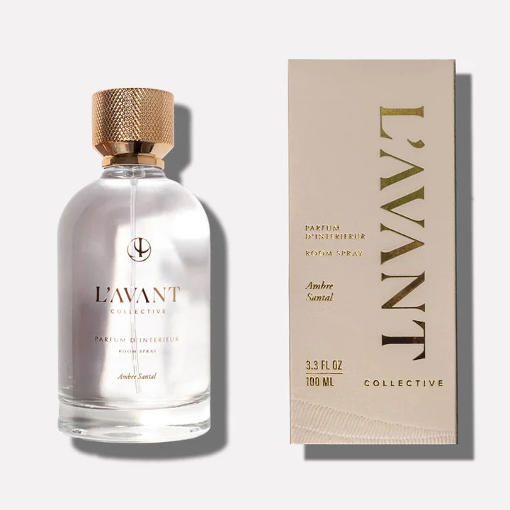 L’AVANT Collective Ambre Santal Room Spray displayed with its coordinating box and elegant gold detailing.
