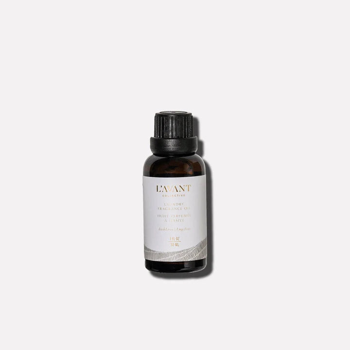 L’AVANT Collective Fresh Linen Laundry Fragrance Oil in a 1 oz amber glass bottle with black cap