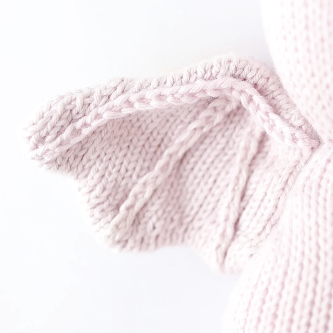 Close-up of the textured knitted wing on the lavender baby bat stuffed animal