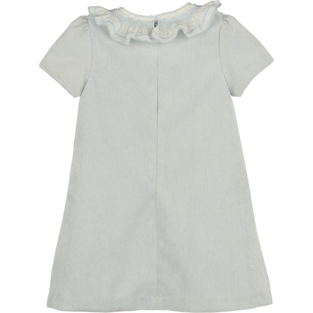 Back view of light blue corduroy A-line girls dress with white ruffled collar, blue embroidered trim, and short sleeves.