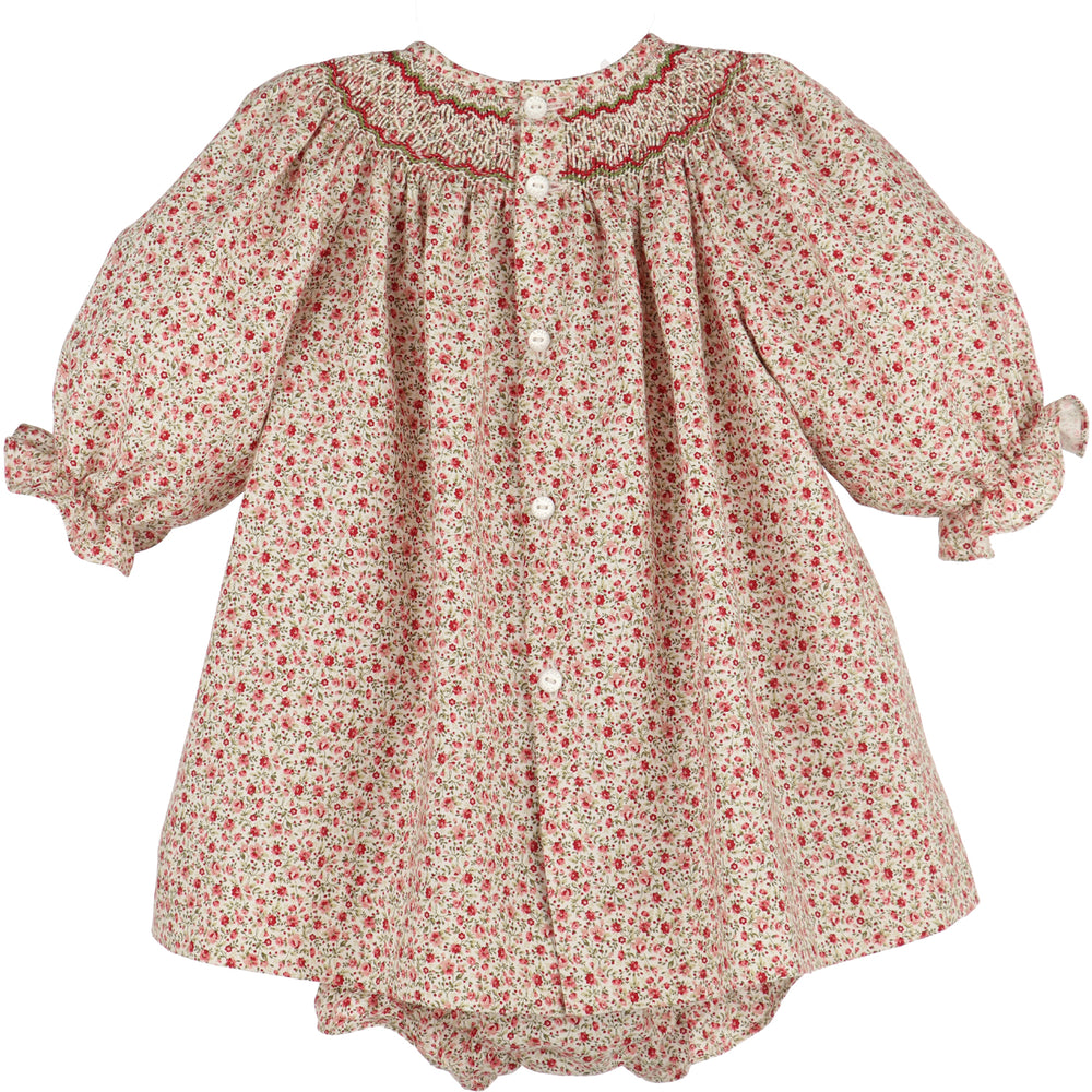 Back of Mulberry Floral Smocked Bishop dress with floral print, smocked neckline, button closure, and ruffled sleeves