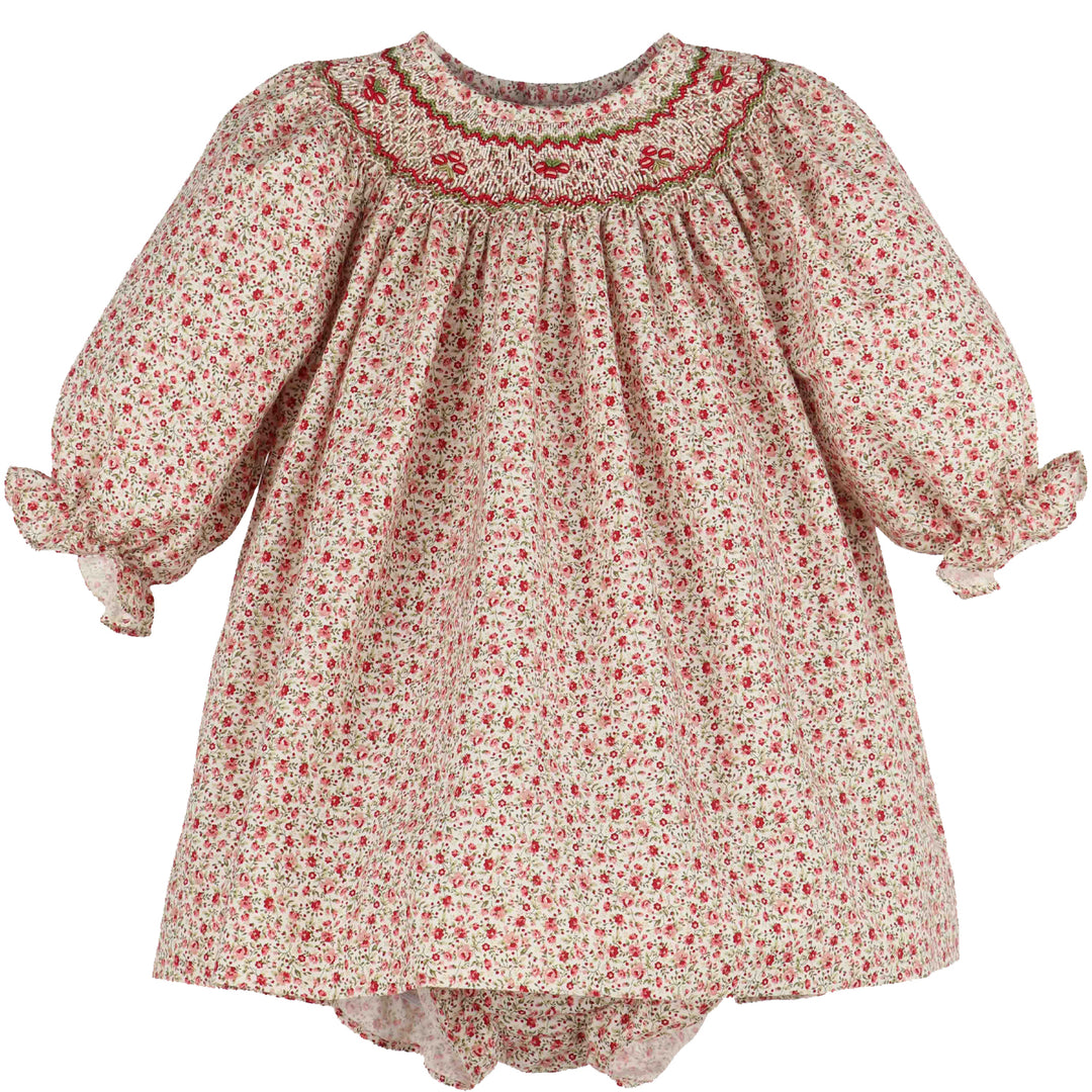 Mulberry Floral Smocked Bishop dress with red floral print, red and green smocked neckline, long puff sleeves, and ruffle cuffs
