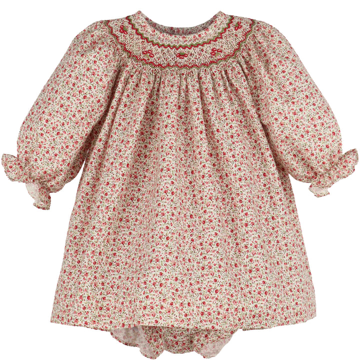 Mulberry Floral Smocked Bishop dress with red floral print, red and green smocked neckline, long puff sleeves, and ruffle cuffs
