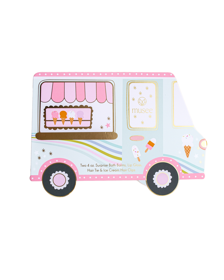 Musee ice cream truck bath balm and accessory set featuring two surprise bath balms, lip gloss, a hair tie, and ice cream hair clips.