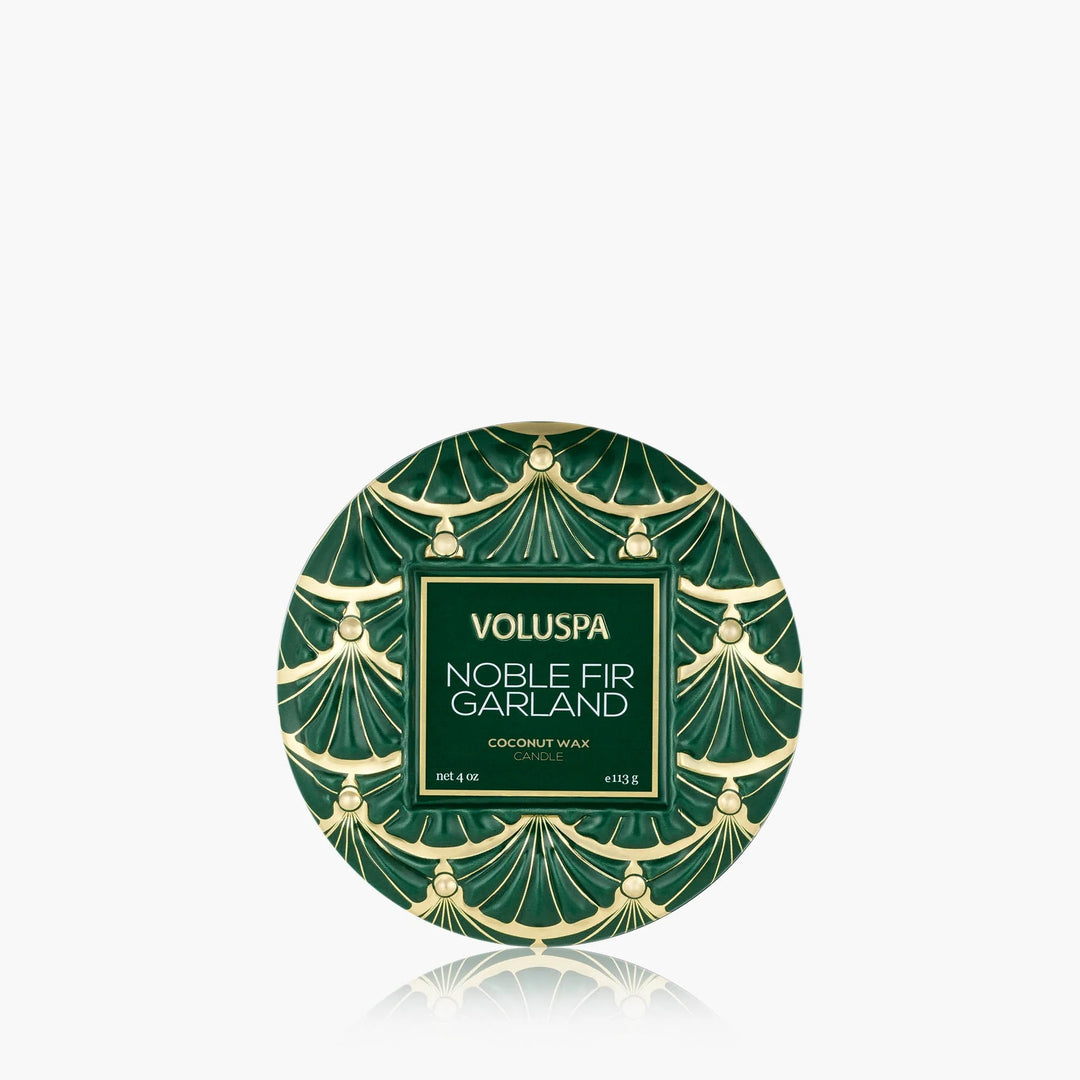Voluspa Noble Fir Garland Mini Tin Candle in emerald green and gold holiday tin with decorative lid