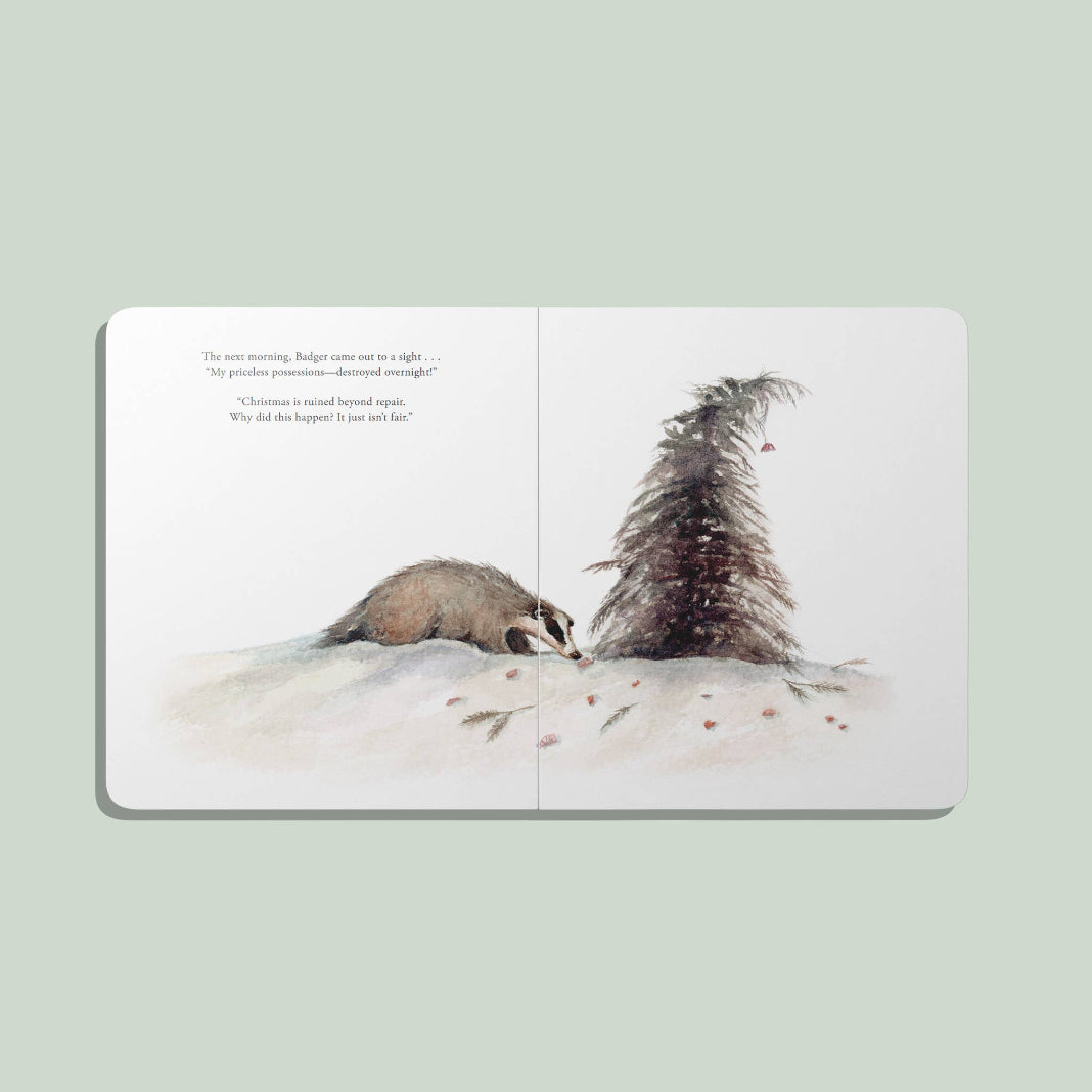 Interior spread from Our Little Adventure at Christmas showing Badger beside a damaged Christmas tree
