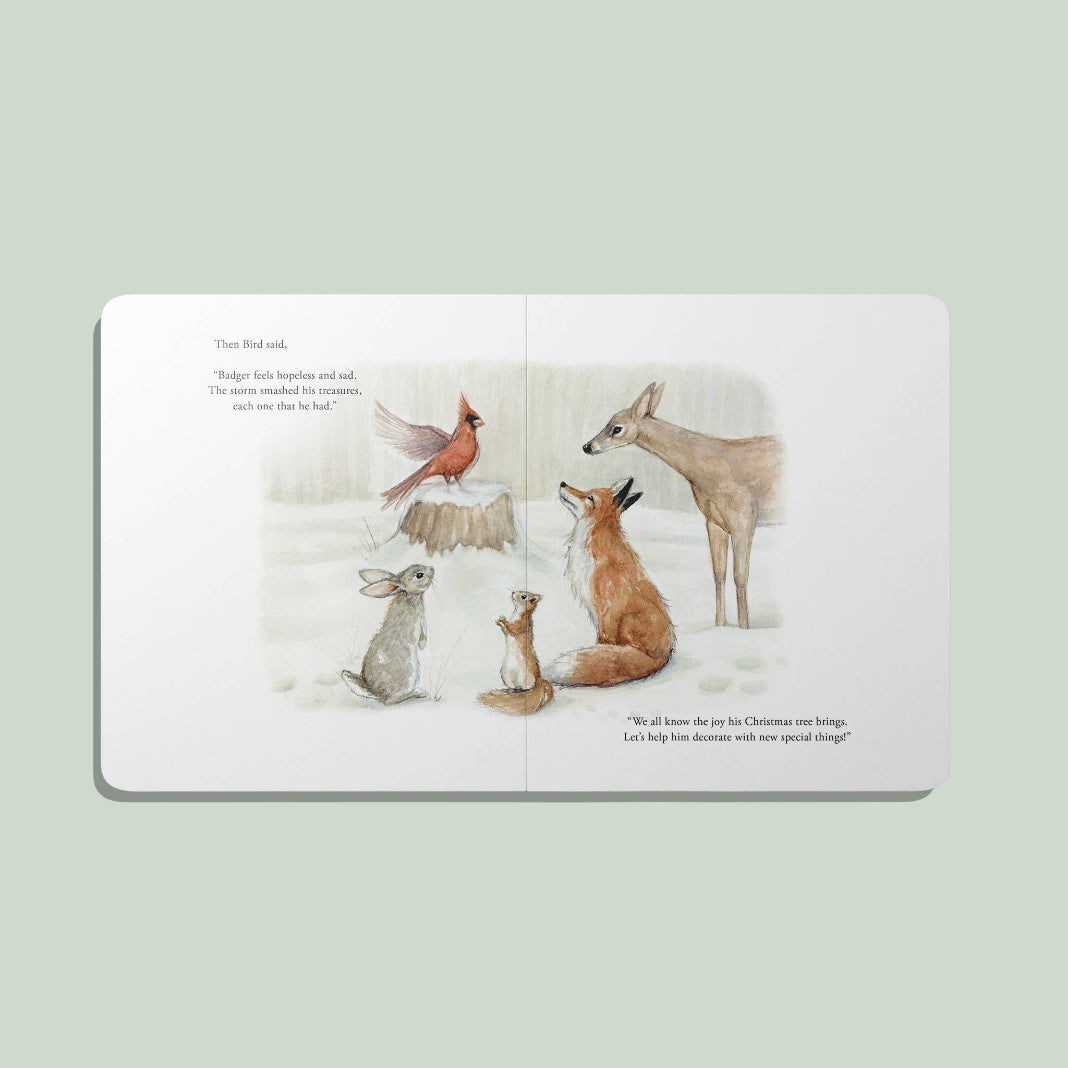 Interior spread from Our Little Adventure at Christmas featuring watercolor woodland animals in a snowy forest