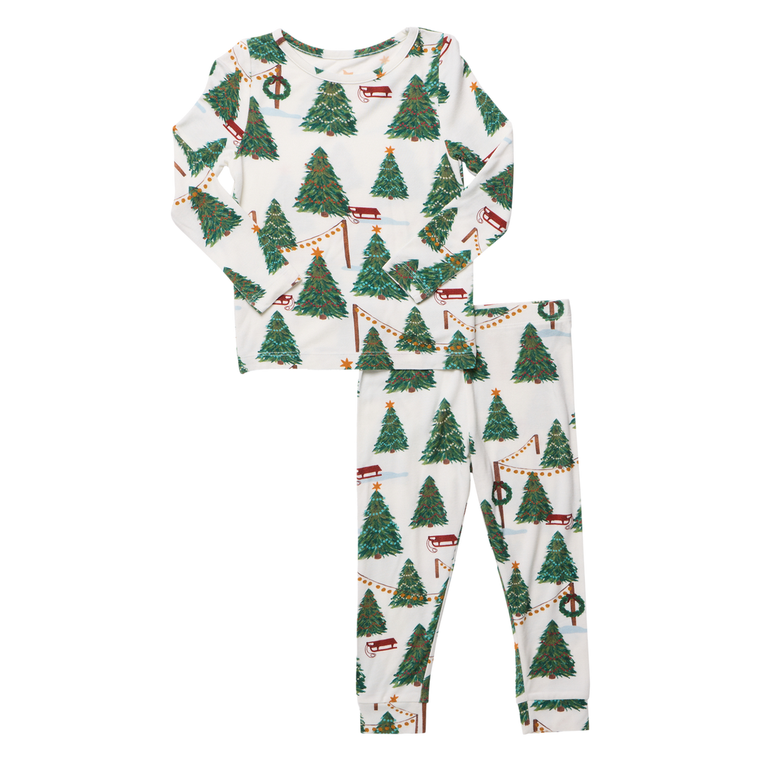 Flat image of the front Pink Chicken's Kids Bamboo PJ Set in their new 'Christmas Tree Farm' Print, featured with no background.
