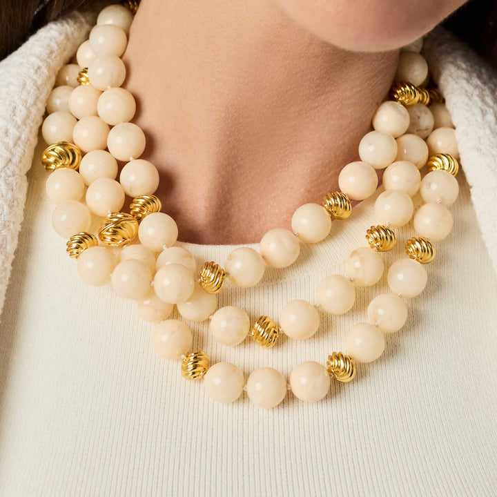 Ravello 5-in-1 Necklace in ivory styled in multiple layered lengths with gold accents