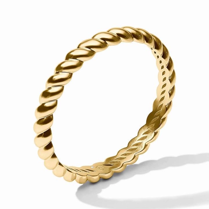 Gold Ravello Bangle showing polished twisted detailing and interior design