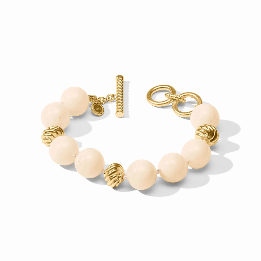 Ravello Bracelet in ivory with round cabochons, sculpted gold accents, and toggle closure
