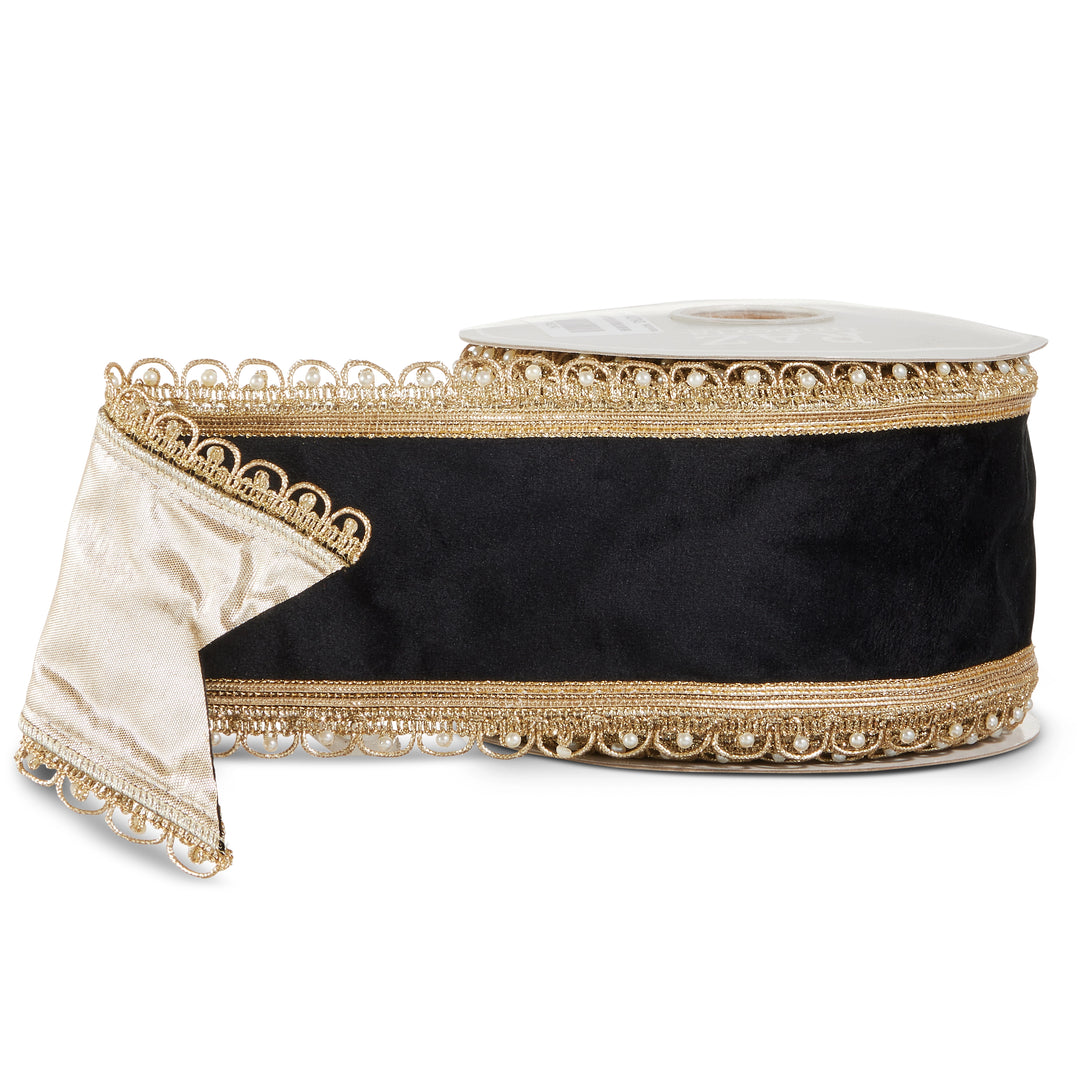 Black velvet Christmas ribbon with gold embroidered trim and pearl accents, shown on a ribbon spool.