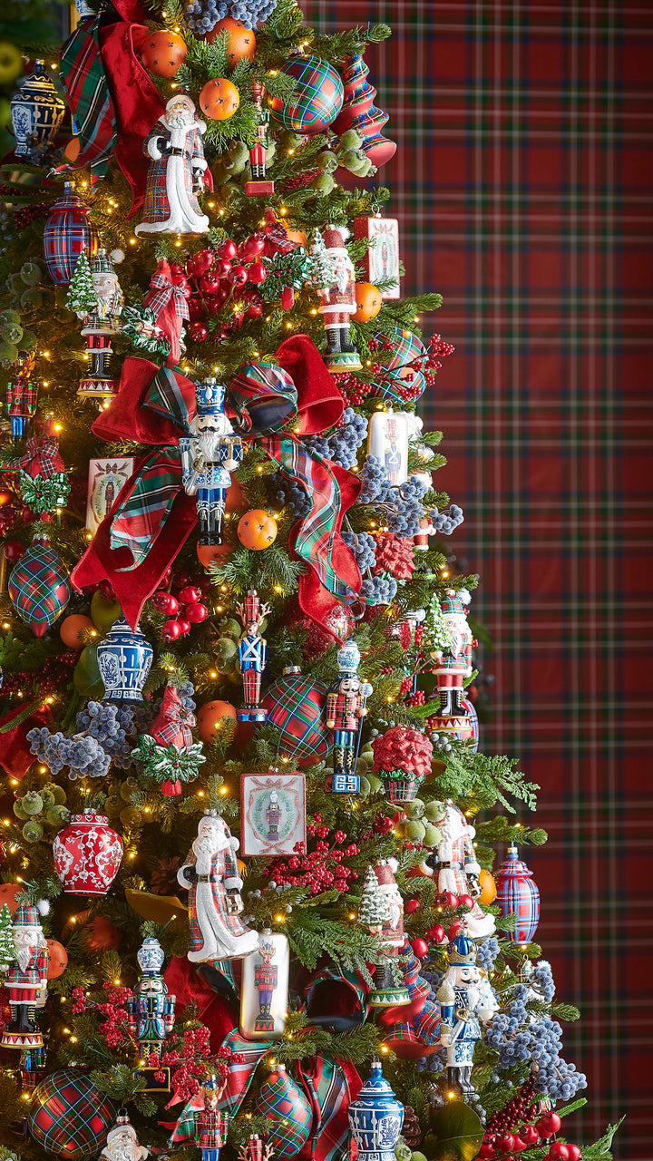 Red and green tartan plaid Christmas ribbon with wired edges, perfect for wreath making, holiday bows, Christmas trees, garlands, and festive décor.