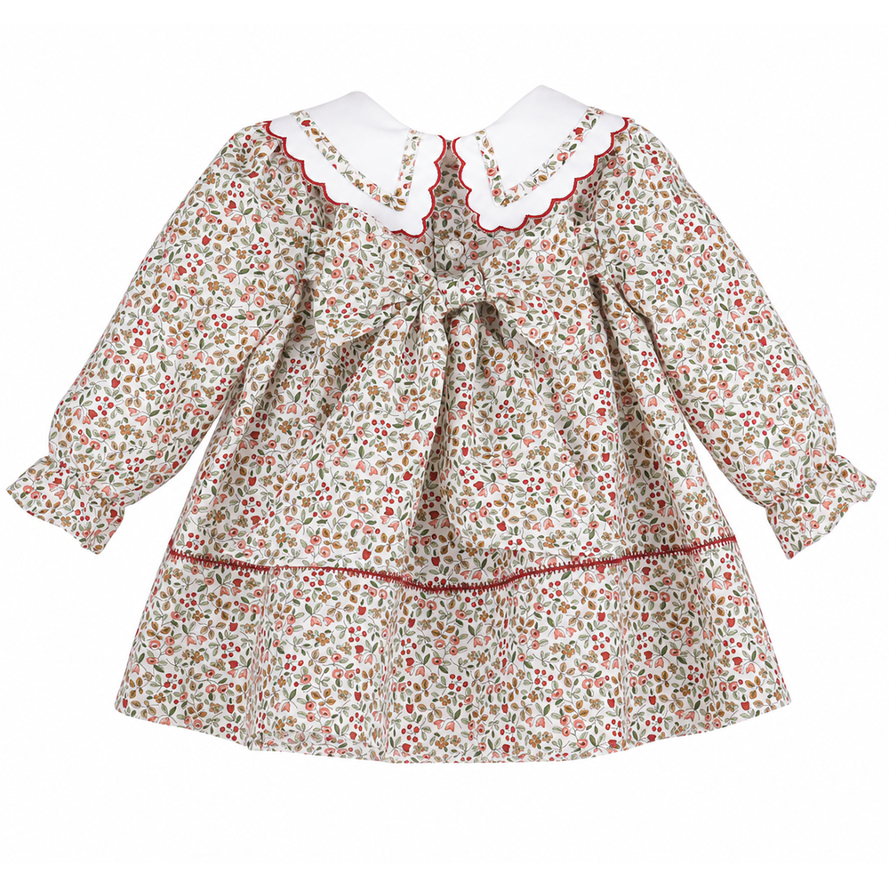 Back view of Red Claret Berries & Blooms baby girl dress featuring a floral berry print, white scalloped collar, red trim, long sleeves, and back bow.