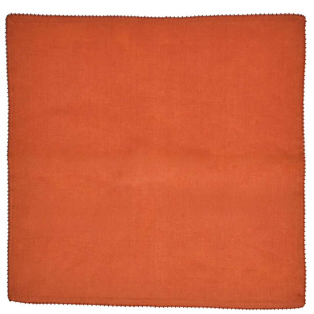 Rust terracotta linen dinner napkin with delicate decorative stitched border