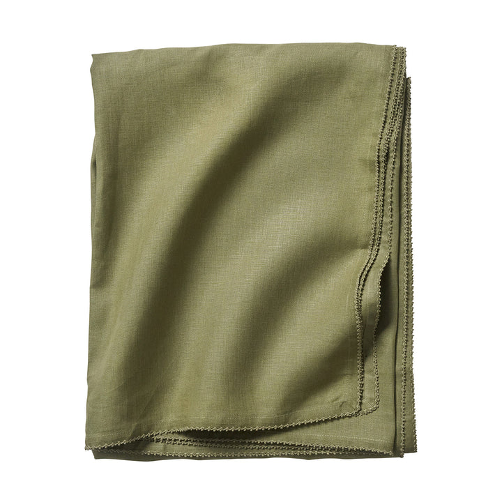 Folded sage green linen tablecloth featuring a delicate tonal crochet edge and softly textured woven finish