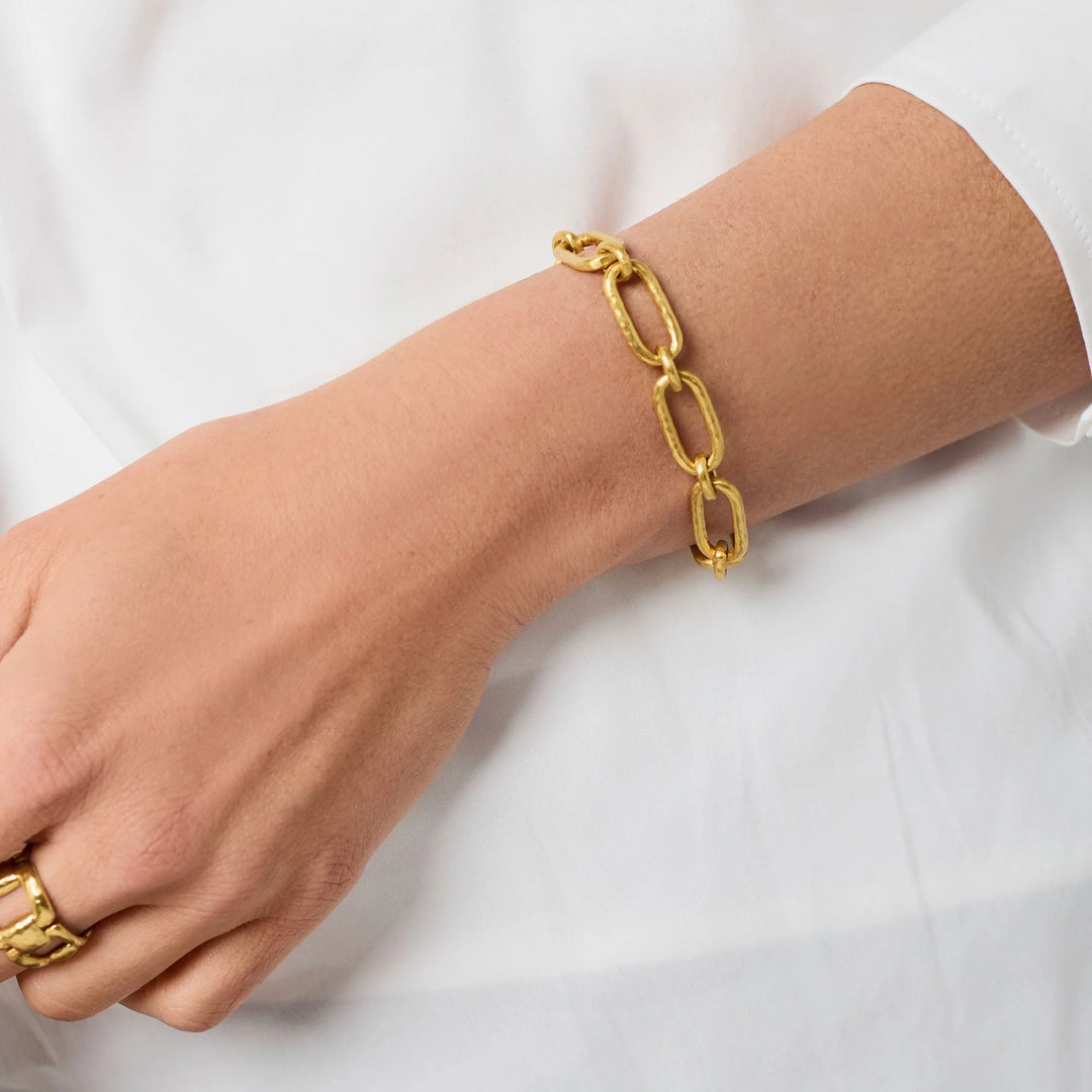 Model wearing the Sahara Demi Link Bracelet in gold