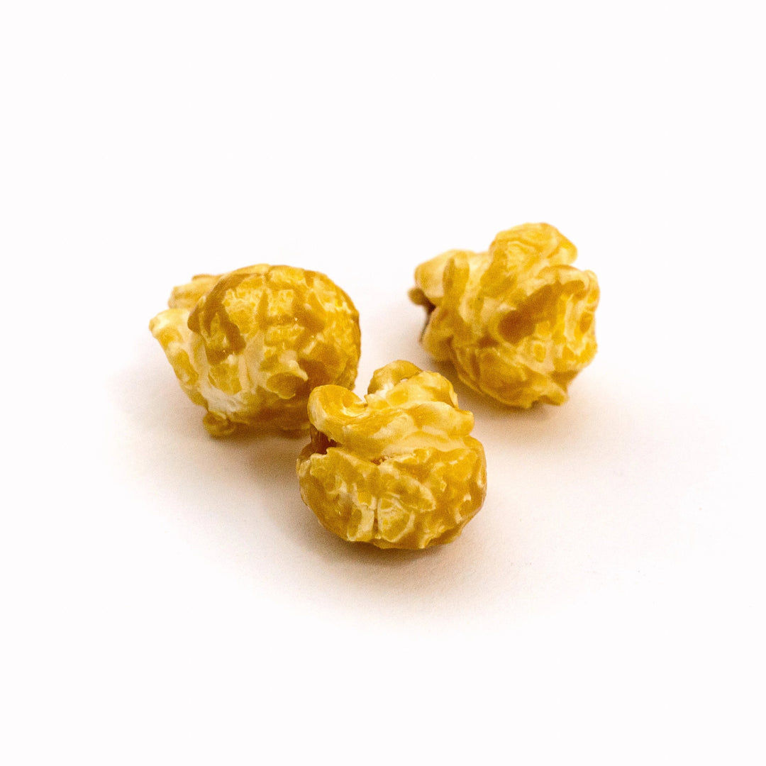 Salted Caramel Hand-Crafted Popcorn pieces coated in buttery caramel