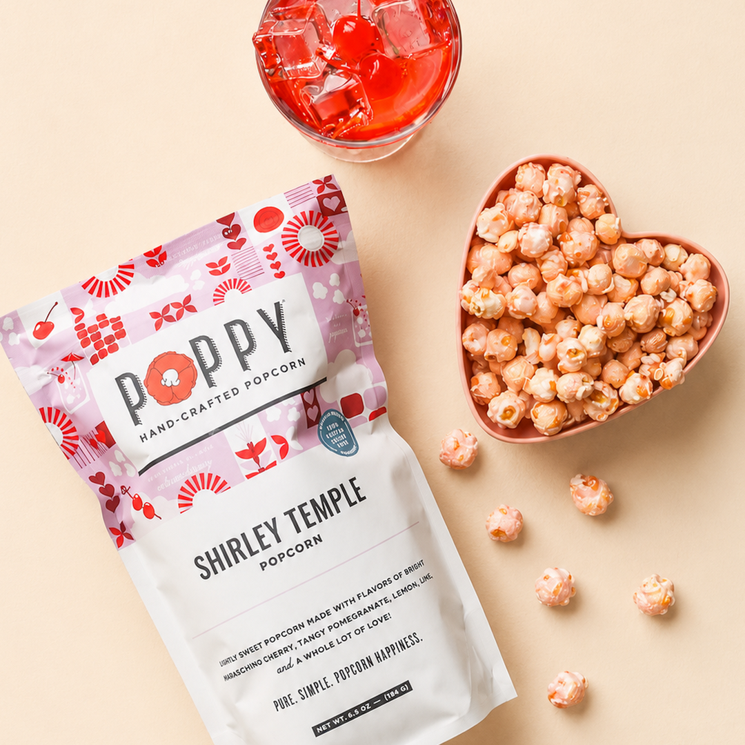 Poppy Shirley Temple Popcorn with pink popcorn in a heart-shaped bowl