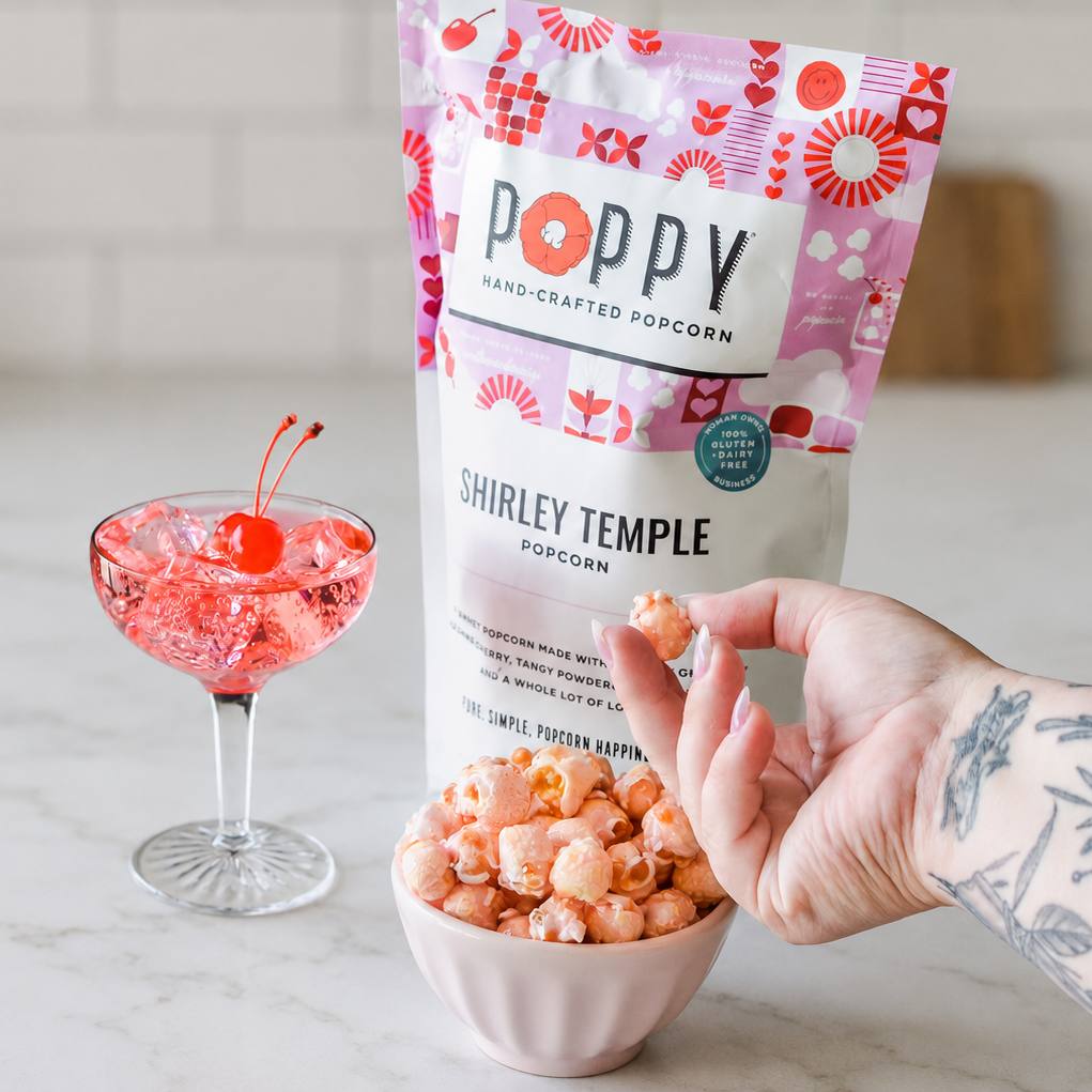 Poppy Shirley Temple Popcorn served with a cherry Shirley Temple drink