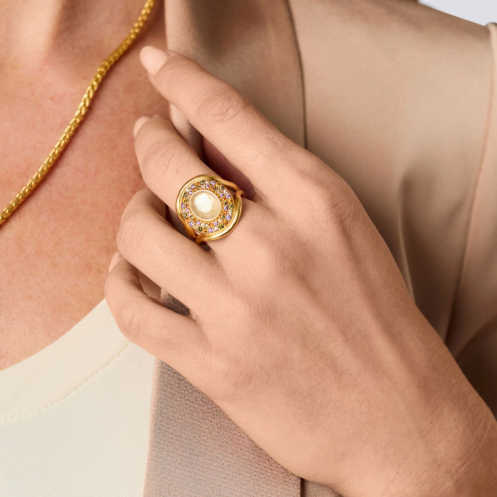 Iridescent champagne Stardust Statement Ring worn on hand with gold-tone setting