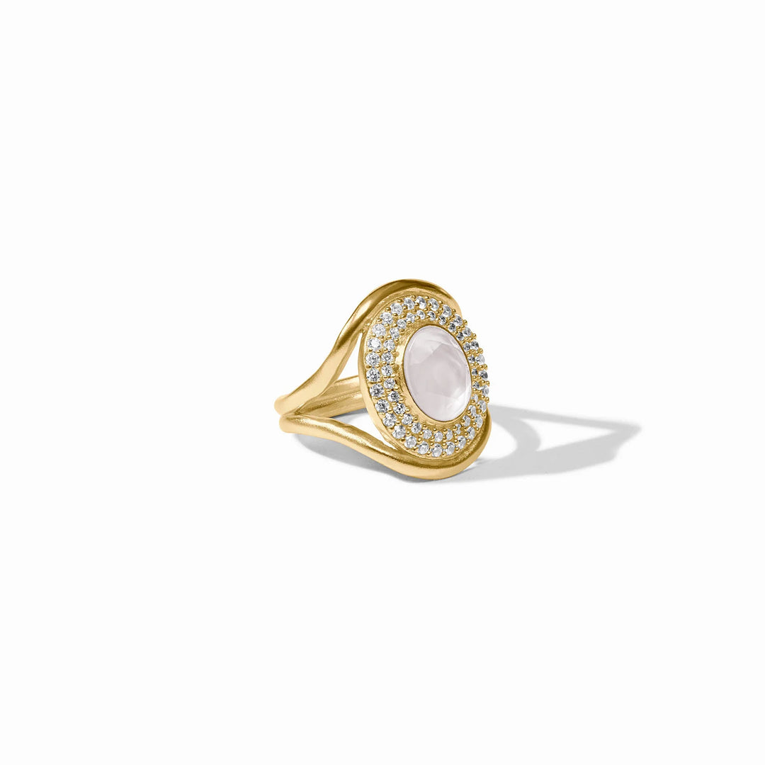 Stardust Statement Ring with iridescent center stone, clear crystals, and gold-tone setting