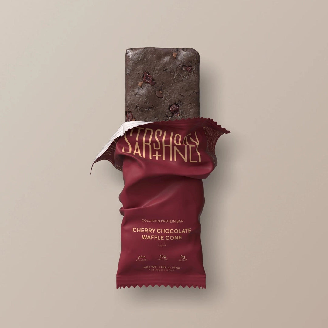 Stars + Honey Cherry Chocolate Waffle Cone collagen protein bar shown inside open wrapper