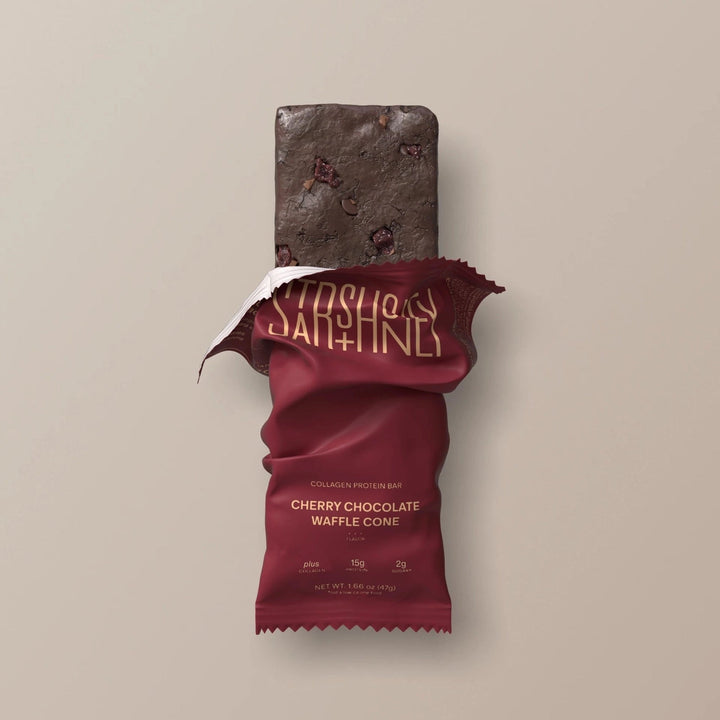 Stars + Honey Cherry Chocolate Waffle Cone collagen protein bar shown inside open wrapper