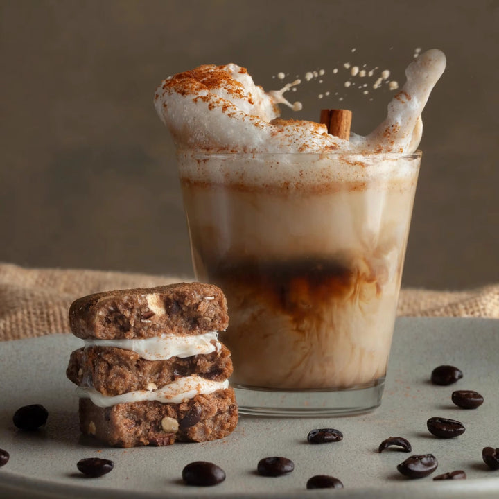 Stars + Honey Espresso Vanilla Cinnamon protein bars styled with iced coffee, cinnamon and coffee beans