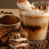 Iced espresso with vanilla, cinnamon and coffee beans representing Stars + Honey Espresso Vanilla Cinnamon flavor