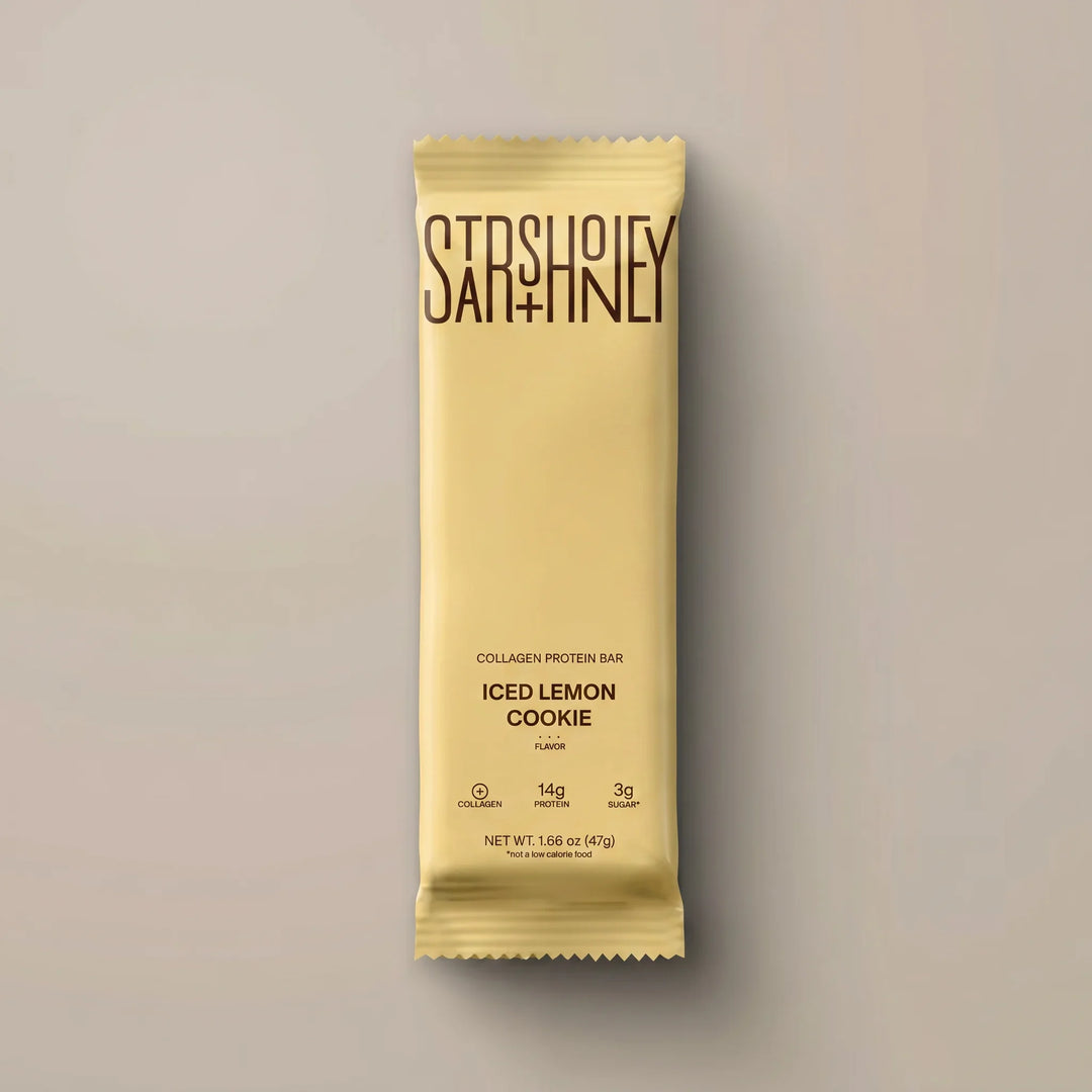 Stars + Honey Iced Lemon Cookie collagen protein bar in yellow wrapper