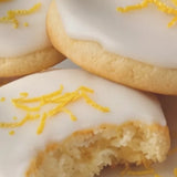 Close-up of Stars + Honey Iced Lemon Cookie collagen protein bar flavor with lemon and creamy cookie pieces