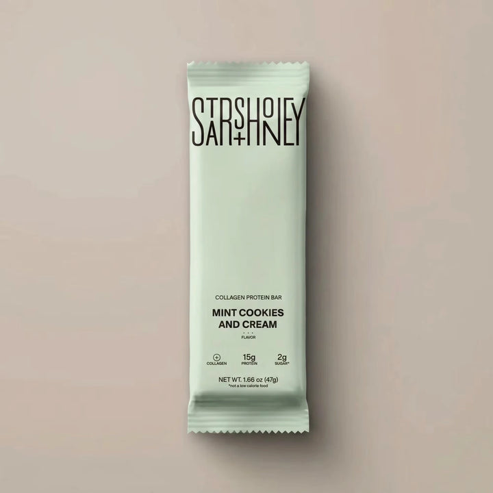 Stars + Honey Mint Cookies and Cream collagen protein bar in mint green wrapper