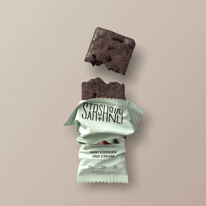Stars + Honey Mint Cookies and Cream collagen protein bar shown inside open wrapper