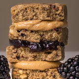 Peanut butter and blackberries representing Stars + Honey Peanut Butter Blackberry flavor