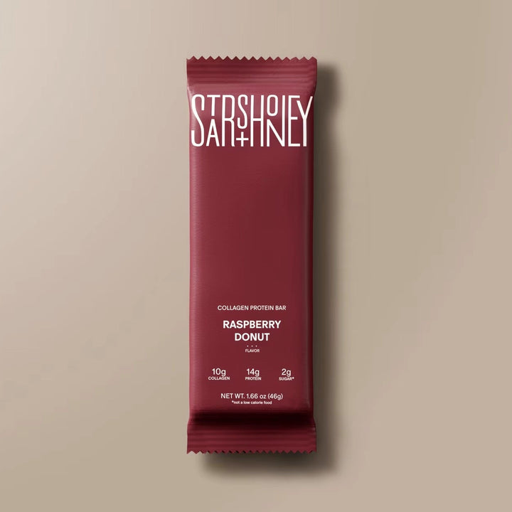 Stars + Honey Raspberry Donut collagen protein bar in raspberry wrapper