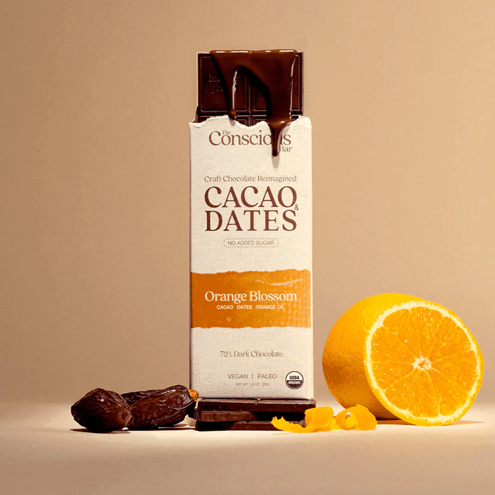 The Conscious Bar Orange Blossom date-sweetened dark chocolate bar with organic orange, cacao and dates