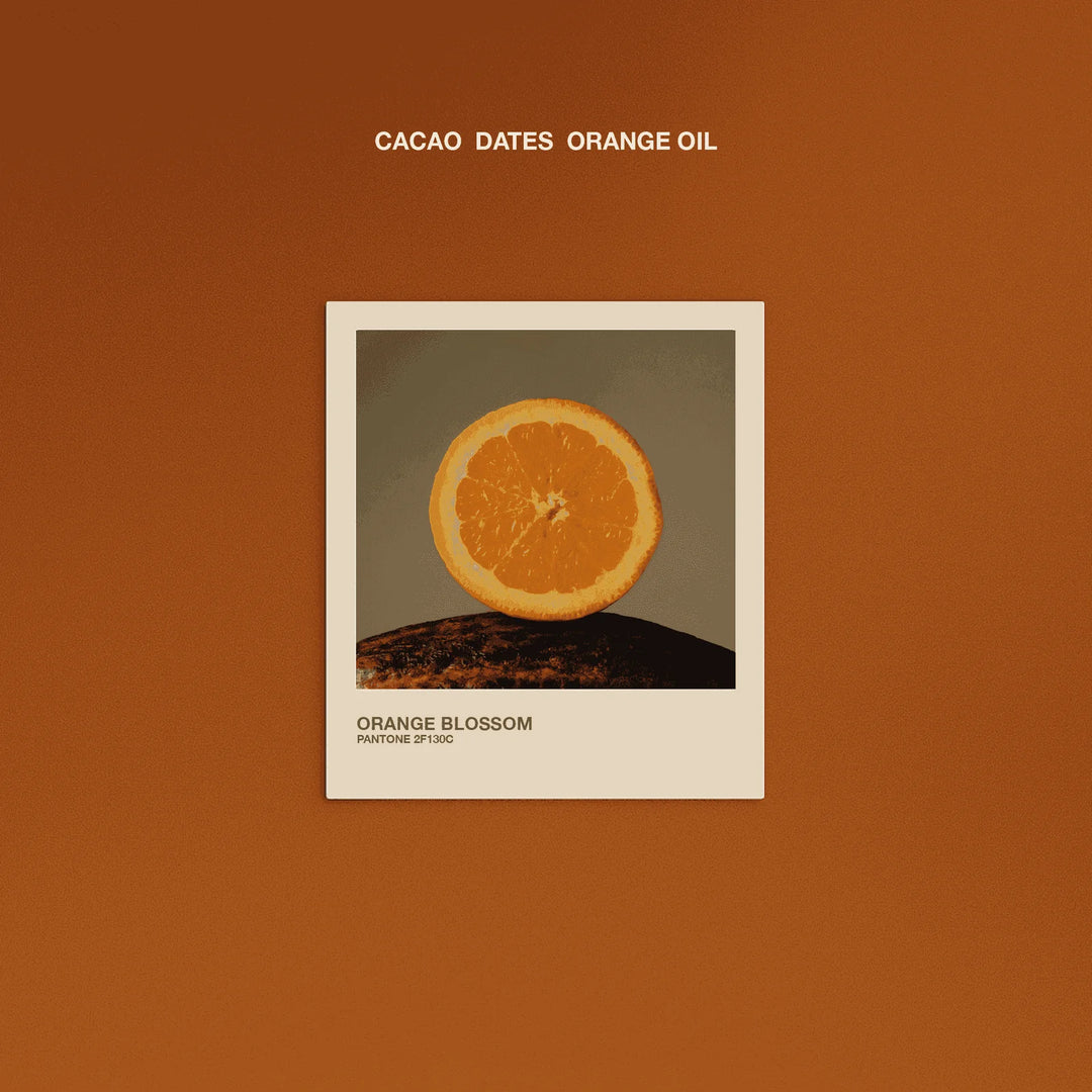 Orange Blossom flavor graphic featuring organic orange, cacao and dates for The Conscious Bar dark chocolate