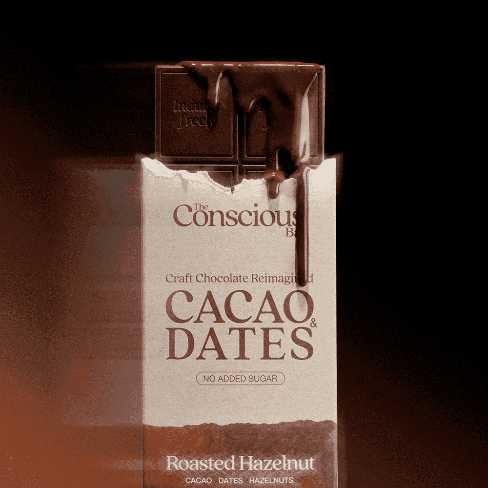 The Conscious Bar Roasted Hazelnut date-sweetened dark chocolate bar and package close-up