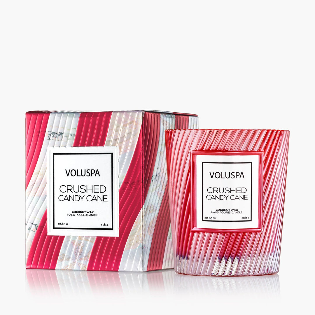 Voluspa Crushed Candy Cane Classic Candle in red peppermint striped glass with coordinating holiday gift box