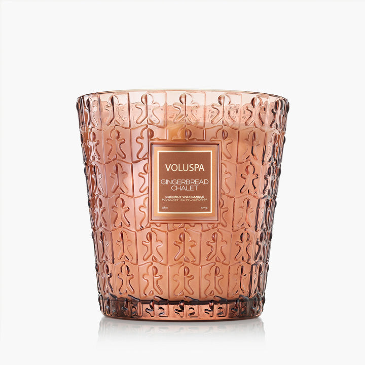 Voluspa Gingerbread Chalet 3 Wick Hearth Candle in warm embossed gingerbread glass vessel