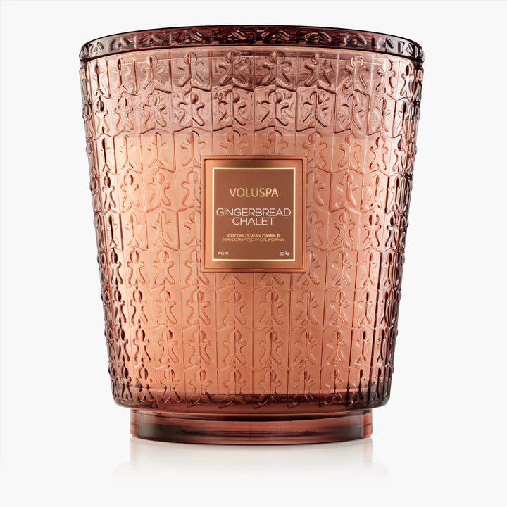 Voluspa Gingerbread Chalet 5 Wick Hearth Candle in oversized embossed gingerbread glass vessel
