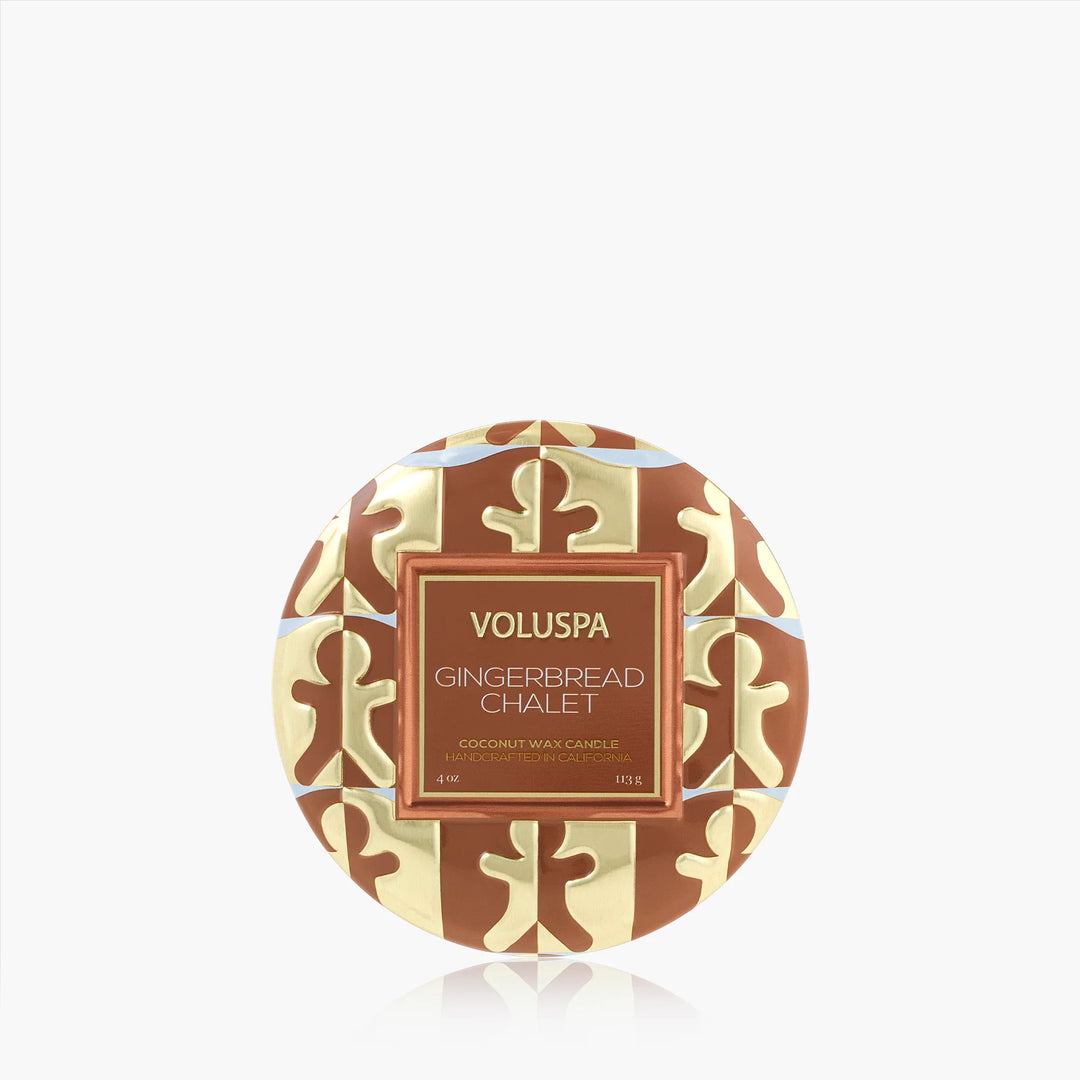 Voluspa Gingerbread Chalet Mini Tin Candle with brown and gold gingerbread-inspired holiday design