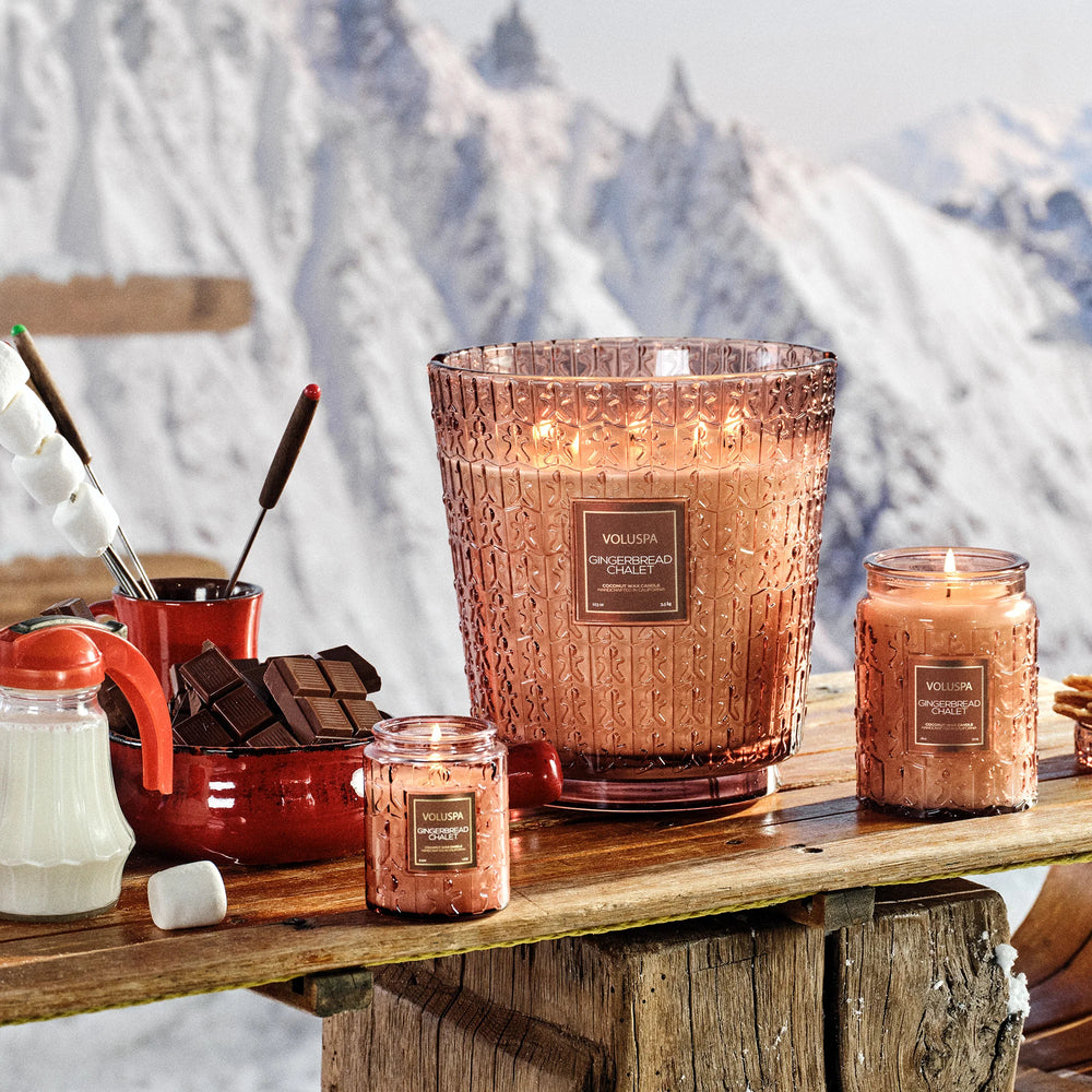 Voluspa Gingerbread Chalet Small Jar Candle displayed with Gingerbread Chalet holiday candles