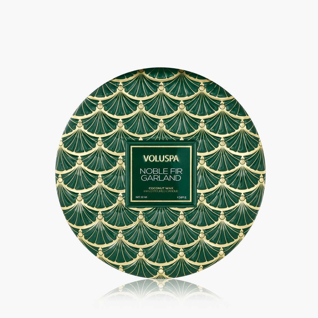 Voluspa Noble Fir Garland 3 Wick Tin Candle in emerald green and gold holiday tin viewed from above