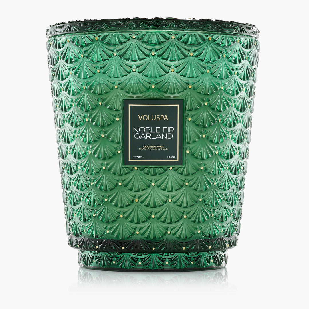Voluspa Noble Fir Garland 5-Wick Hearth Candle in oversized embossed emerald green glass with decorative lid