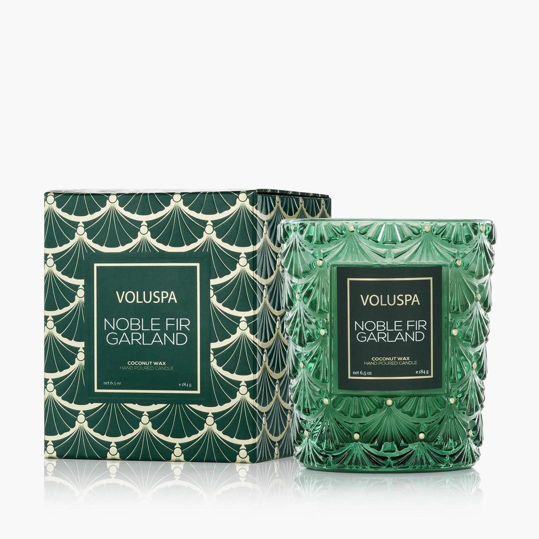 Voluspa Noble Fir Garland Classic Candle in emerald green embossed glass with coordinating holiday gift box
